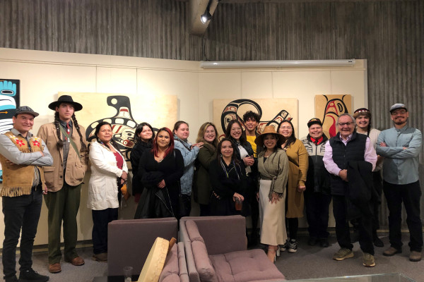 A group of indigenous artists gathered for an art gallery show opening.